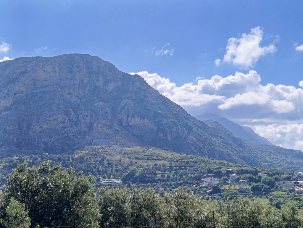Vorizi mountains and clouds above Spili with Mount Ida in the distance.